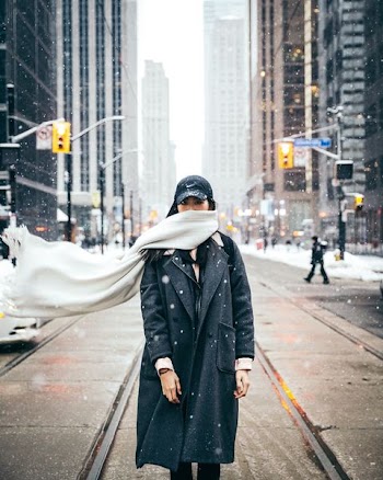 woman inside road during snow