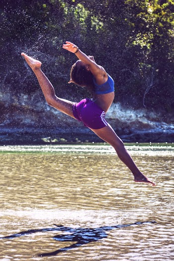 Woman Jump on Body of Water