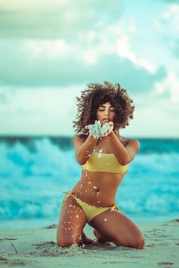 Woman Kneeling on Ground