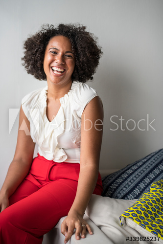 Woman laughing out loud with happiness