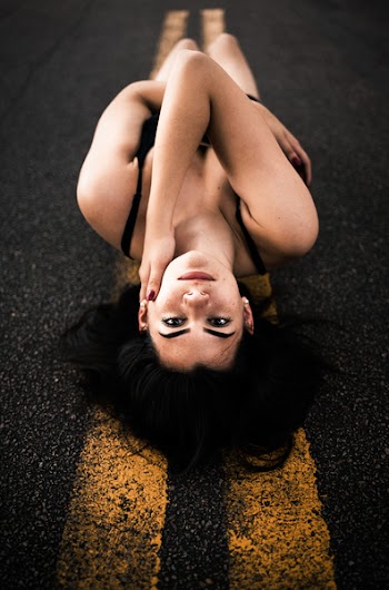 Woman Laying On Road