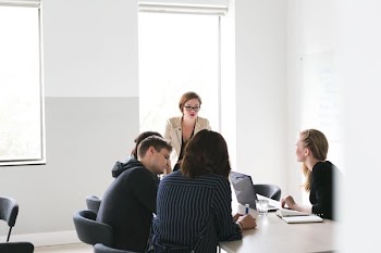 Woman Leads Creative Meeting