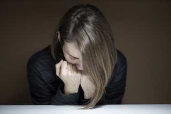 Woman Leaning at the Table