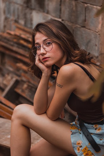 Woman Leaning Face on Right Hand