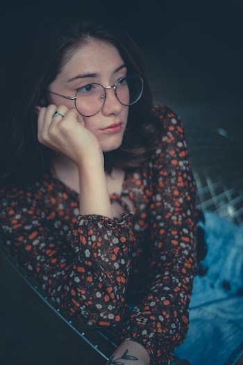 Woman Leaning Her Head to Hand