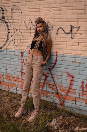 Woman Leaning on a Wall