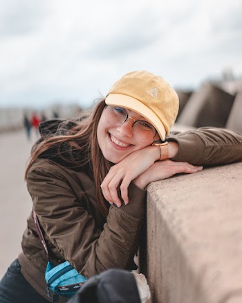 Woman Leaning on a Wall