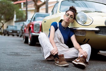 Woman Leaning On Car 