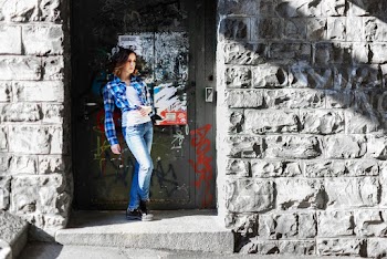 Woman Leaning on Door