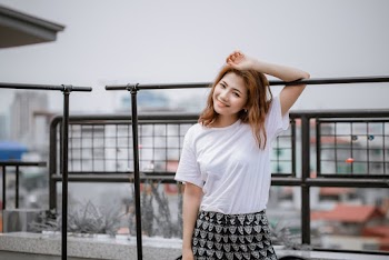 Woman Leaning on Frame