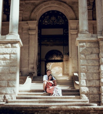 Woman Leaning on Man Sitting on Concrete Stair