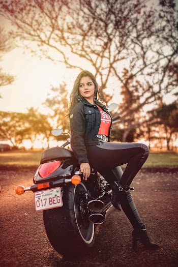Woman Leaning On Motorcycle