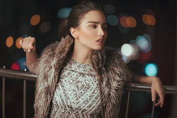 Woman Leaning On Railing