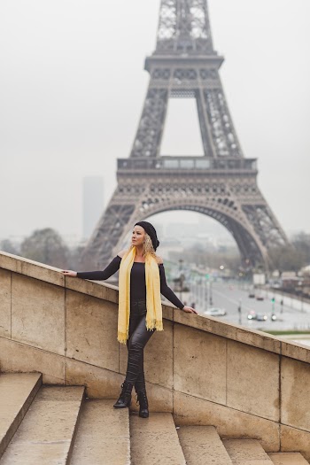 Woman Leaning on Stairs Rails Near Eiffel Tower