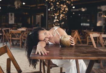Woman Leaning on Table