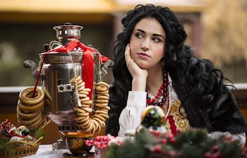 Woman Leaning on Table With Food