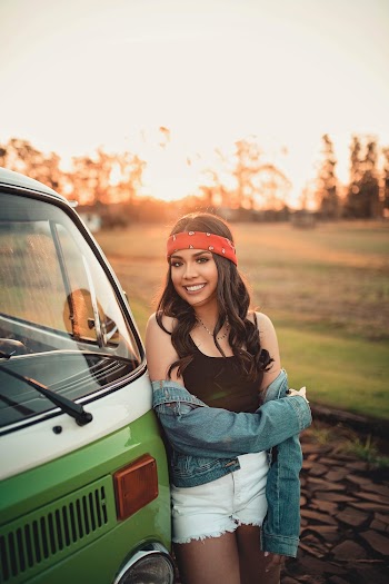 Woman Leaning on Volkswagen T2 Van