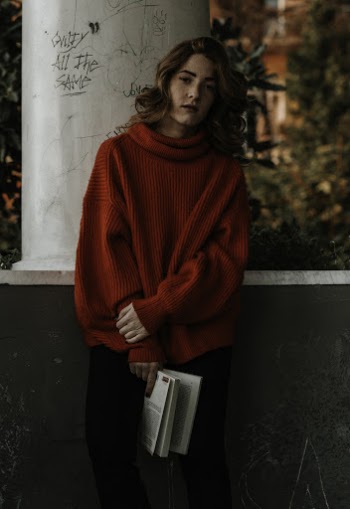 Woman Leaning on Wall