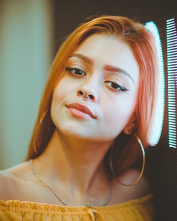 Woman Leaning on Wall