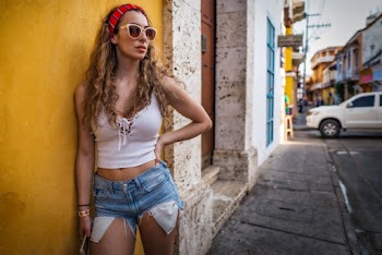 Woman Leaning on Wall