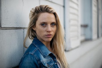 Woman Leaning On Wall