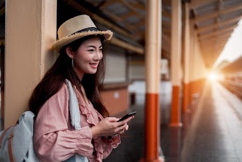 Woman Leaning on Wall