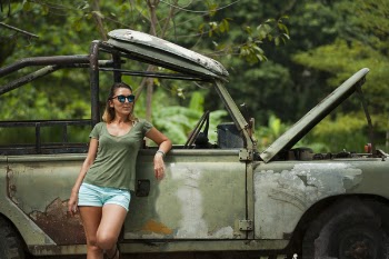 Woman Leaning on Wrangler With Hood Open