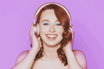 Woman listening to music through her | Free Photo - rawpixel