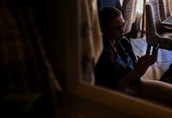 Woman Looking at Her Phone