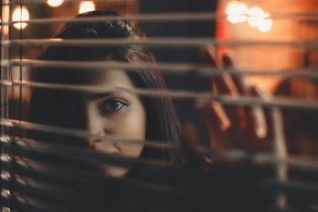 Woman Looking at the Window