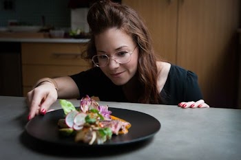woman looking dish