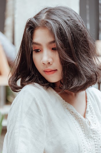 Woman Looking Downward 