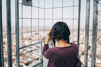Woman Looking on Telescope