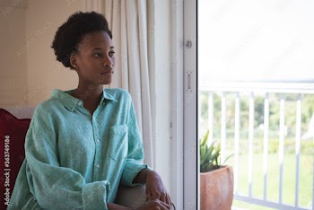 Woman looking out of the window