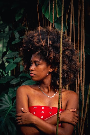 Woman Looking to Her Right With Her Arms Crossed