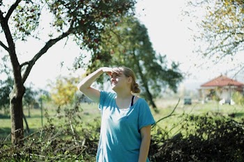 Woman Looking Upwards