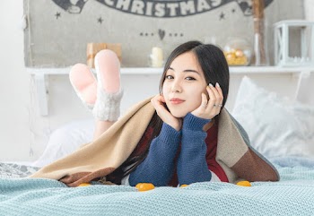 Woman Lying on Bed
