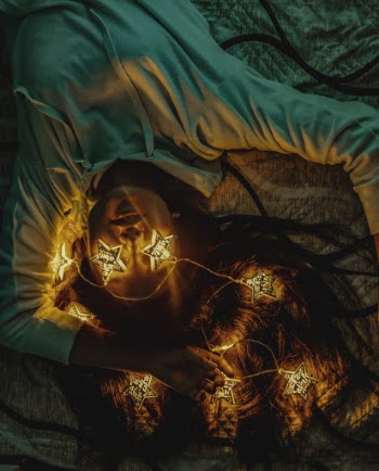 Woman Lying On Bed