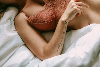 Woman Lying on Bed