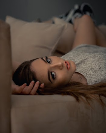 Woman Lying on Bed