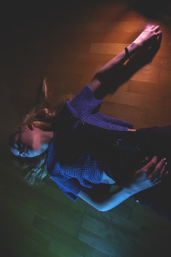 Woman Lying on Floor