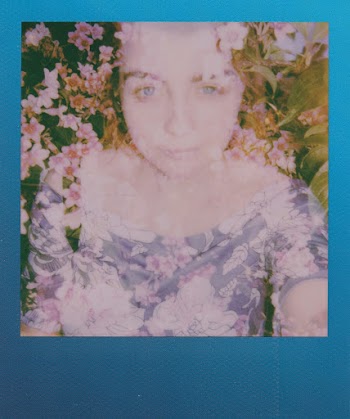Woman Lying on Flowers Photo