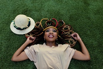 Woman Lying on Green Grass