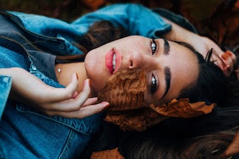Woman Lying on Ground