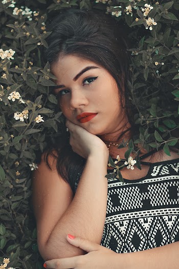 Woman Lying on Plants