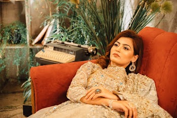 Woman Lying On Sofa