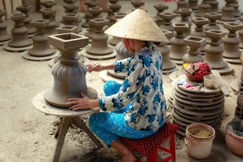 Woman Making Clay Pot