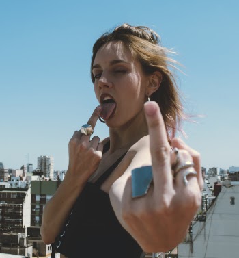 Woman Making Hand Sign