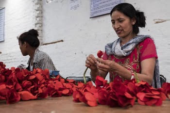 Woman making paper flowers, Kathmandu, | Free Photo - rawpixel