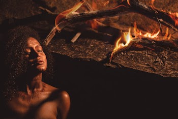 Woman Near Burning Woods